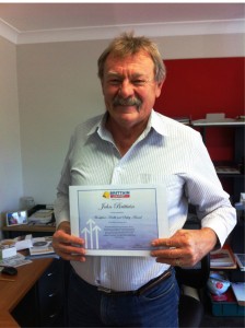 John accepts his Workplace Health and Safety Award for September. 