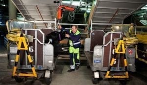 Vaculex Baggage Handling - Loading Baggage from Chute to Open Cart